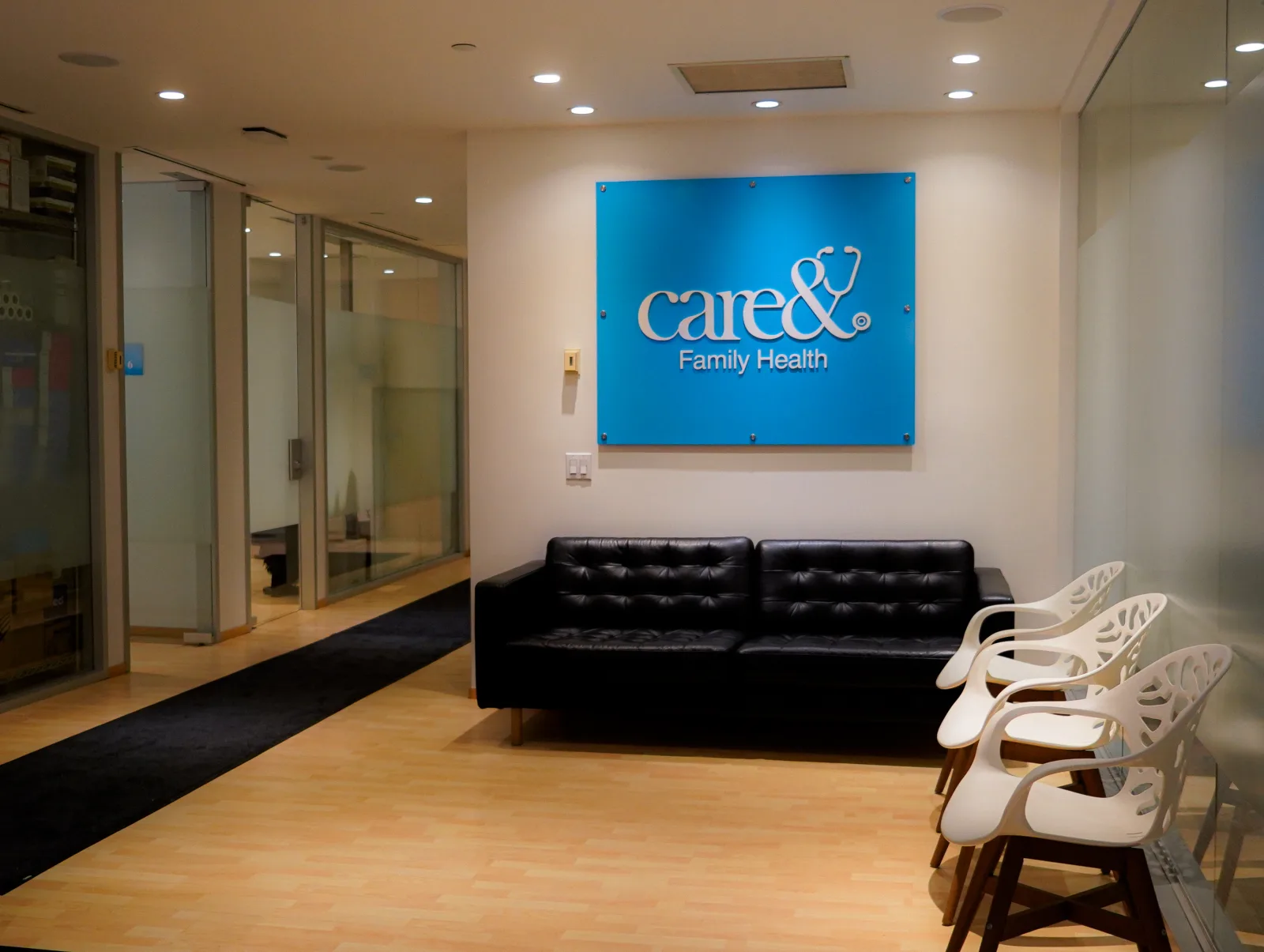 Care& Yorkville waiting area with branded sign